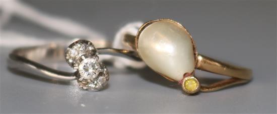 3 stone diamond ring and a pearl ring